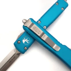 Microtech UTX-70 147-10TQ Turquoise Double Edge Stonewash 7 Microtech UTX-70 147-10TQ Turquoise Double Edge Stonewash -Microtech Shop 309718046 899520514786254 8640916690204903364 n 93597.1665371673