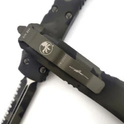 Microtech Ultratech 122-3OCS Olive Camo Double Edge Full Serrated -Microtech Shop 310239507 1070787050280207 4090010504427763947 n 75098.1665371352
