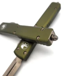 Microtech UTX-70 147-13OD OD Green Double Edge Bronze -Microtech Shop 310494182 1136316447316439 8112369004027920197 n 41489.1665371433