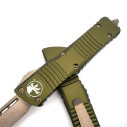 Microtech 144-13OD Combat Troodon OD Green Tanto Edge Bronze Blade -Microtech Shop 312210927 1774400746254912 9139202847599257047 n 44221.1666240304