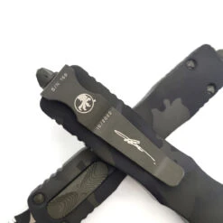 Microtech 225-3OCS Dirac Olive Green Camo Double Edge Full Serrated -Microtech Shop 312362960 1155660925040193 5801821923333773289 n 72577.1666240193