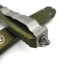 Microtech Ultratech 123-10APOD Green Tanto Edge Apocalyptic -Microtech Shop 317378424 1295843451264419 5973622307830835711 n 91237.1670310145