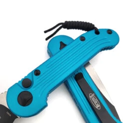 Microtech L.U.D.T. 135-1TQ Turquoise LUDT Black Two Tone Standard -Microtech Shop 331304318 497881132514169 4855640123063888624 n 89528.1676523944