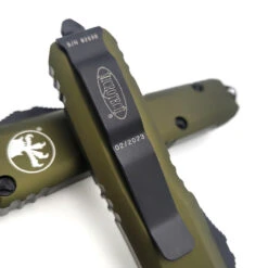 Microtech UTX-85 231-2OD OD Green Single Edge Partial Serrated Black Standard -Microtech Shop 334916557 153941870486784 207038075524446753 n 65579.1678244512