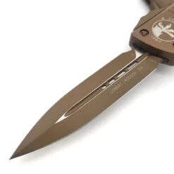 Microtech Combat Troodon 142-1CTA Cerakote Tan Double Edge -Microtech Shop 339960043 807297251145929 1173986122908127890 n 97934.1680669255