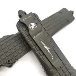 Microtech Combat Troodon142-1CT-COD Delta D/E Frag Cerakote OD Green Fluted Cerakote OD Green Standard Nickel Boron Internals -Microtech Shop 345414776 1033565577626156 8528759559258793033 n 41096.1686020047
