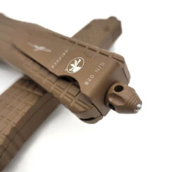 Microtech Combat Troodon142-1CT-CTA Delta D/E Frag Cerakote Tan Fluted Cerakote Tan Standard Nickel Boron Internals -Microtech Shop 345466845 640473631332286 5799172440804043518 n 81775.1686061017