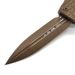 Microtech Combat Troodon142-1CT-CTA Delta D/E Frag Cerakote Tan Fluted Cerakote Tan Standard Nickel Boron Internals -Microtech Shop 351737325 2235532126635286 4976435931069248318 n 41211.1686061018