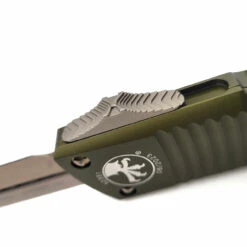 Microtech 142-13OD Combat Troodon OD Green Double Edge Bronze Blade -Microtech Shop 355790195 190546187002883 7106295860651436306 n 02651.1687923332