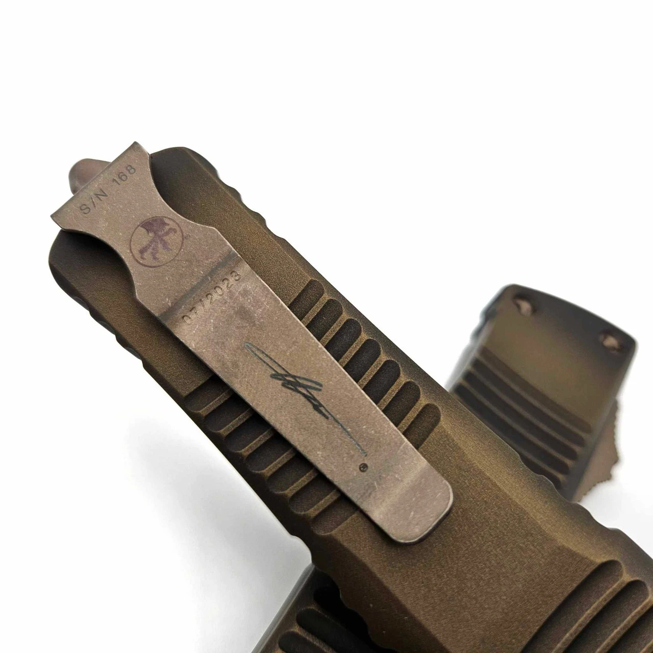 Microtech 143-14APABS Combat Troodon Antique Bronze Handle Single Edge Partial Serrated Bronze Apocalyptic Blade & Hardware 5 Microtech 143-14APABS Combat Troodon Antique Bronze Handle Single Edge Partial Serrated Bronze Apocalyptic Blade & Hardware - Image 5