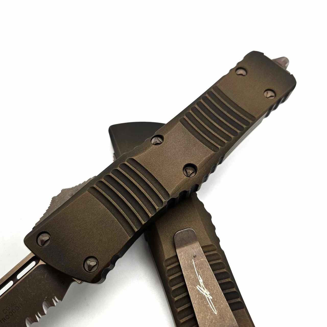 Microtech 143-14APABS Combat Troodon Antique Bronze Handle Single Edge Partial Serrated Bronze Apocalyptic Blade & Hardware 7 Microtech 143-14APABS Combat Troodon Antique Bronze Handle Single Edge Partial Serrated Bronze Apocalyptic Blade & Hardware - Image 7