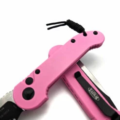 Microtech L.U.D.T. 135S-2BPK Smooth Chassis Cerakote Blasted Pink Standard LUDT Partial Serrated Two Tone -Microtech Shop 375767884 2271410639721336 3298819568628376731 n 61798.1694390474