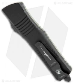 Microtech Signature Series Combat Troodon D/E OTF Auto Knife Jade G-10 (3.8") -Microtech Shop Microtech Combat Troodon DE OTF Auto Jade G 10 Black 142 1GTJGS BHQ 90233 jr side