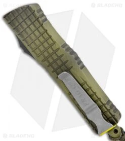 Microtech Combat Troodon D/E OTF Frag Off Series Green (4" Serr) 142-DR12 -Microtech Shop Microtech Combat Troodon DE OTF Frag Off Series Green Serr BHQ 134788 jr side
