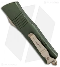 Microtech Combat Troodon Hellhound Tanto OTF Knife OD Green (3.8" Bronzed) -Microtech Shop Microtech Combat Troodon Hellhound Tanto OTF OD Green Bronzed 219 13OD BHQ 87936 jr side