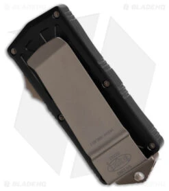 Microtech Exocet Dagger CA Legal OTF Automatic Knife Black (1.9" Bronzed Serr) -Microtech Shop Microtech Exocet Dagger CA Legal OTF Automatic Knife Black 1in Bronzed Serr BHQ 181942 td side