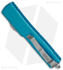 Microtech UTX-70 D/A OTF D/E Automatic Knife Turquoise (Stonewash Full Serr) -Microtech Shop Microtech UTX 70 DA OTF DE AK Turquoise SW Full Serr BHQ 98282 td side