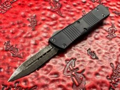 Microtech Troodon Double Edge Damascus Signature Series Ringed Titanium Hardware